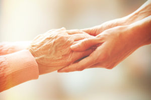 Baby Boomers, Woman caring for elderly